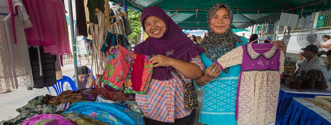 Home-based workers sell their products on the market.